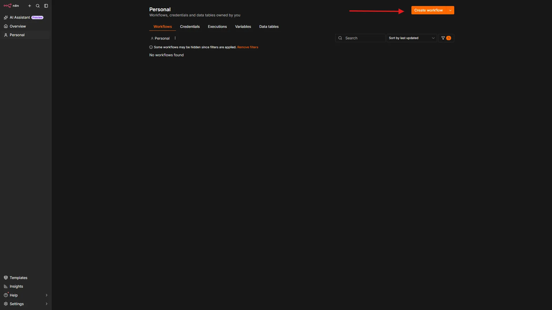 n8n dashboard showing the Create Workflow button with a red arrow pointing to it